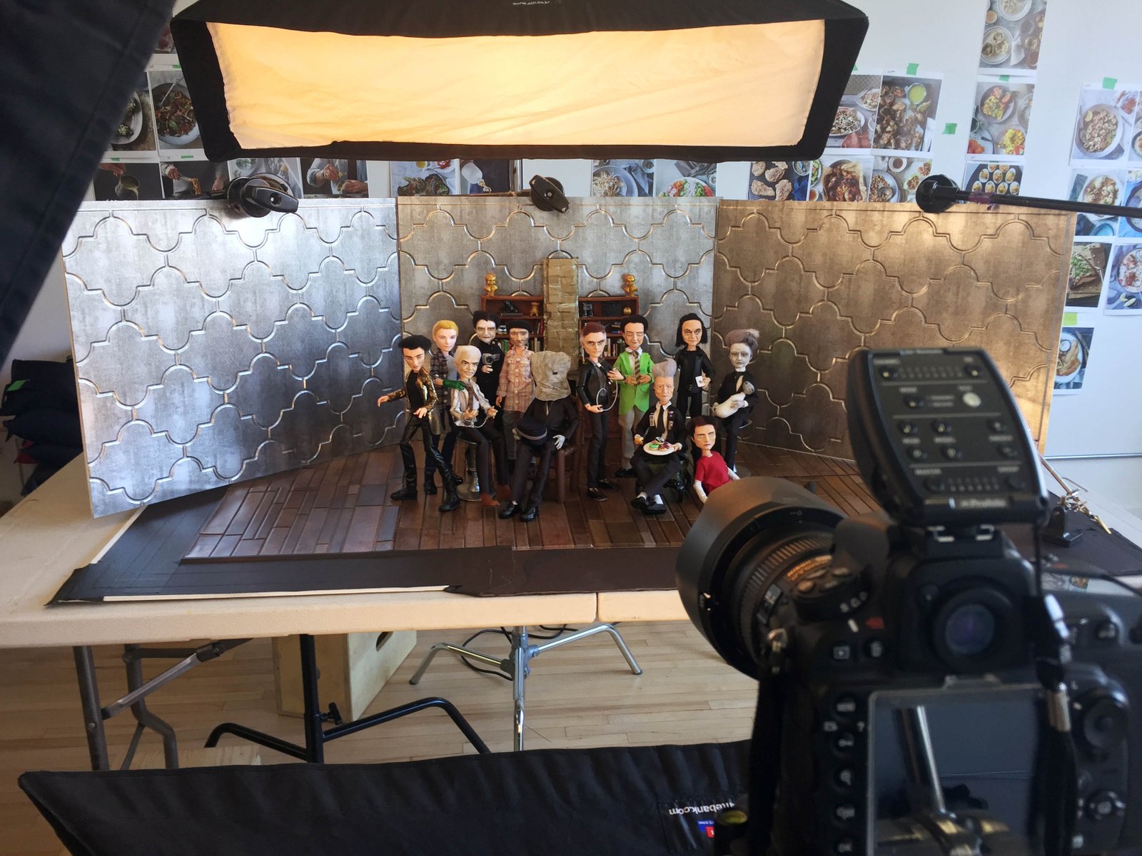 The Men of Lynch dolls being photographed by Blake Morrow