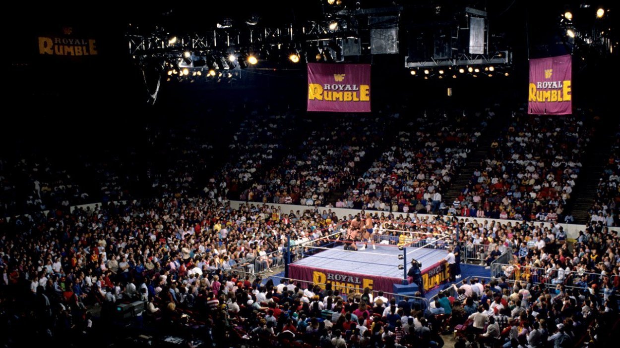 Aerial view of the crowd looking into the ring with several wrestlers in the ring for the Royal Rumble