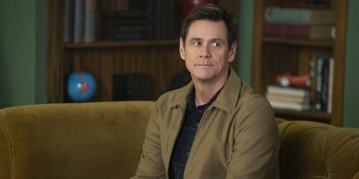 Jeff stares off from a couch