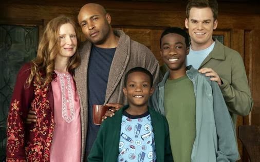 Keith and David, along with their sons and Ruth pose for picture on the porch