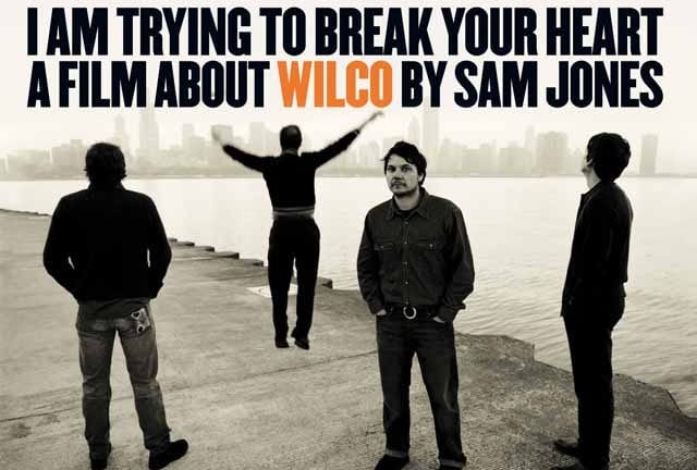 Wilco posing on a dock for the documentary film poster