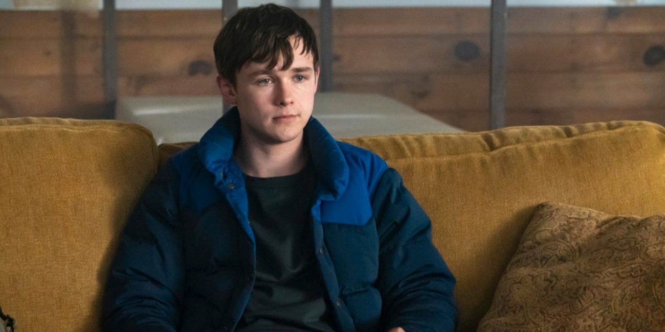 Harrison sits on the couch in Dexter: New Blood