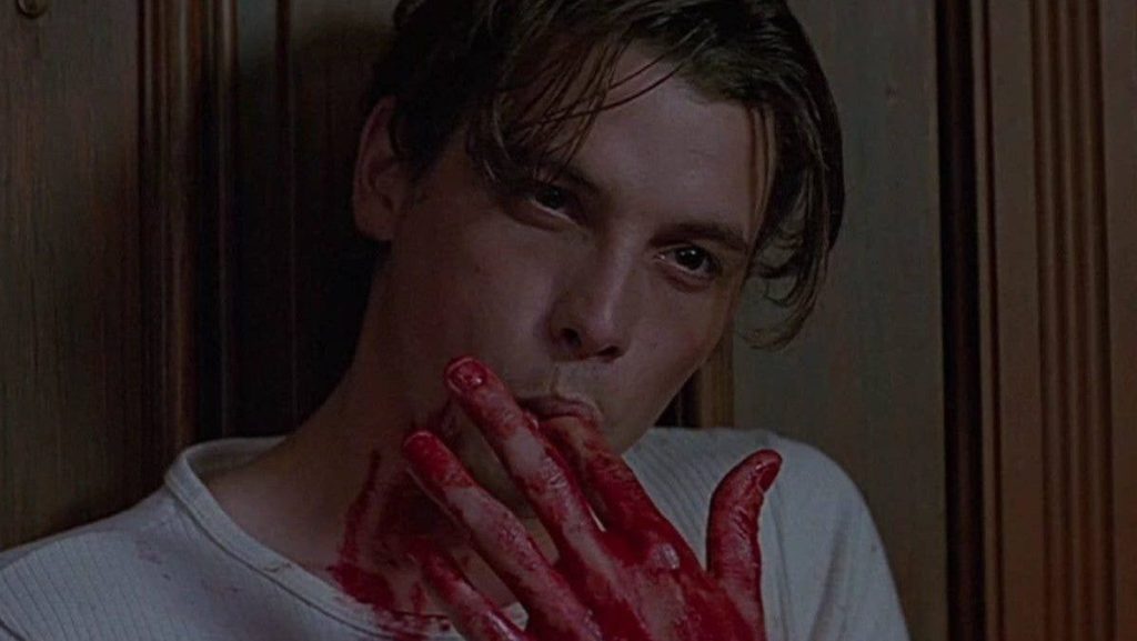 Billy licks blood in Scream