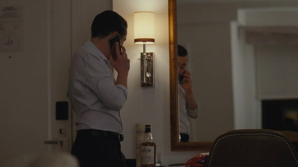 Roman looks in the mirror in Succession S2E4
