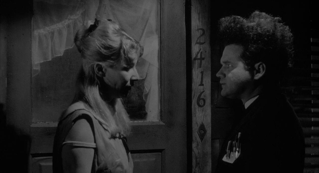 Henry & Mary outside her door in Eraserhead