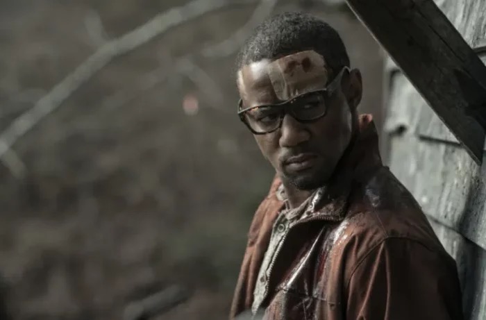 Davon hides against a wall in Tales of the Walking Dead Episode 5