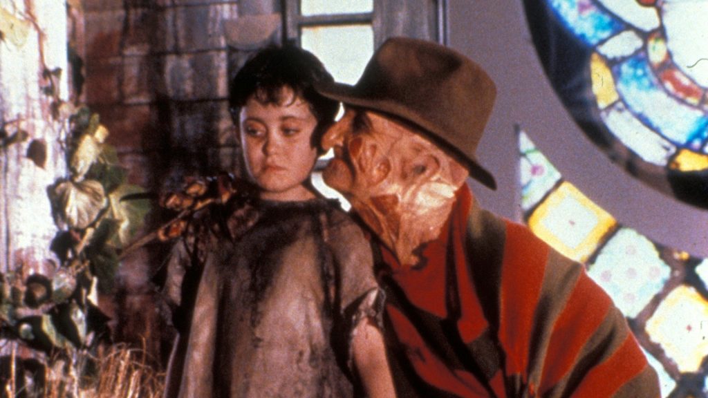 Freddy holds a boy in A Nightmare on Elm Street 5