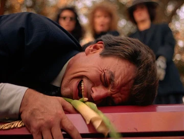 Leland jumps on Laura’s casket in Twin Peaks “Rest in Pain”